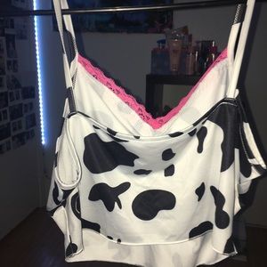 Cow print tank top, never worn, about a medium.